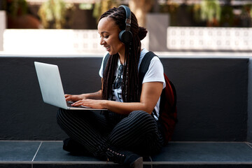 Woman, student and headset or typing laptop, outside and online classes for elearning or education....