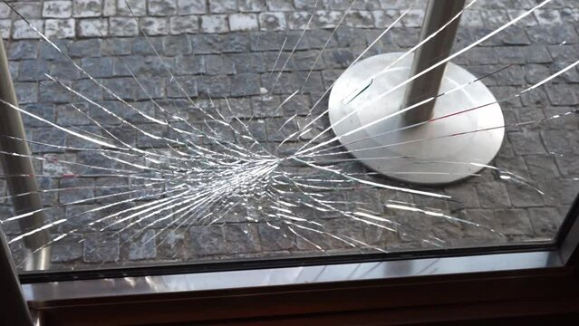 looters broke the glass on the doors
