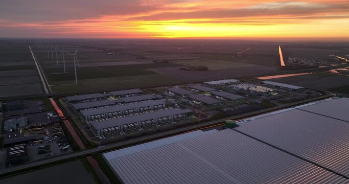 Datacenter in Middenmeer in the municipality of Hollands Kroon. AI, Cloud and internet infrastructure, building exterioir at sunset
