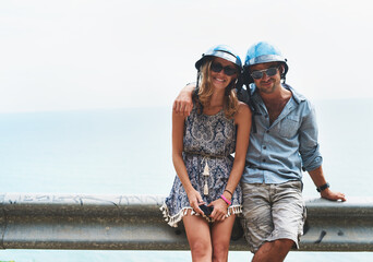 Smile, travel and couple with sunglasses for vacation, adventure or holiday together. Happy, summer...