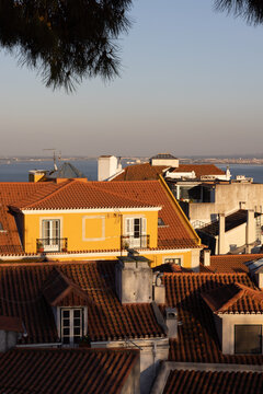 View of boats on the Tagus River in Lisbon, Portugal at dusk from Sao Jorge castle.