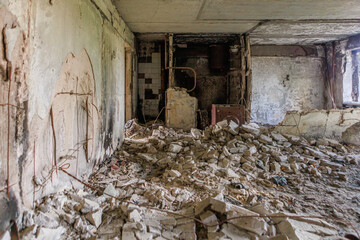 Destroyed and abandoned residental building during war in Ukraine.