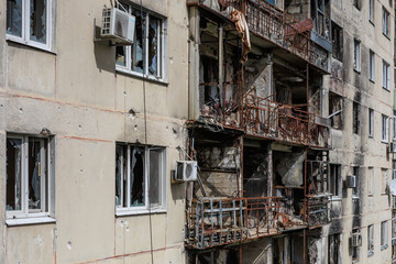 Residential building destroyed by military actions in Ukraine.