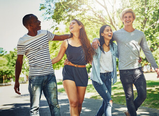 Diversity, team and happy friends laugh outdoor together for support, joke and solidarity in summer...
