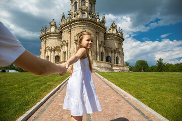 Obraz premium Portrait of a little blonde girl, summer outdoor