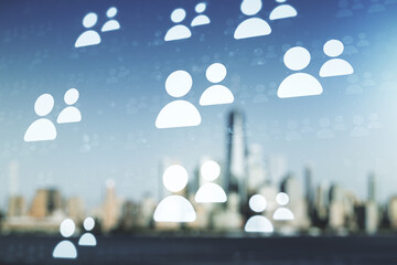 Double exposure of abstract virtual social network icons on blurry cityscape background. Marketing...