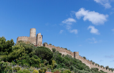 Obraz premium Monte Ursino Castle in the old village of Noli on the Italian Riviera. Noli, Ligury, Italy