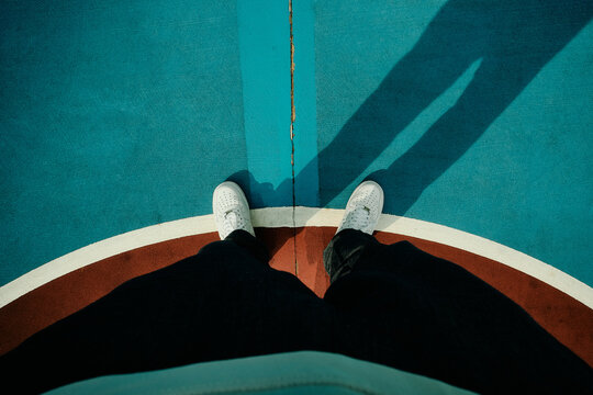 standing  on the basketball court