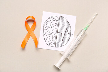 Drawing of brains, syringe and orange ribbon on grey background. Multiple Sclerosis Awareness Month