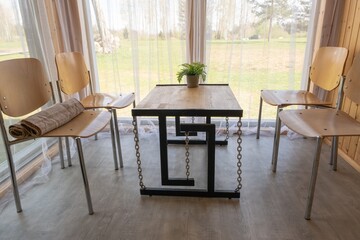 Modern Wooden Chairs and Table in Bright Room