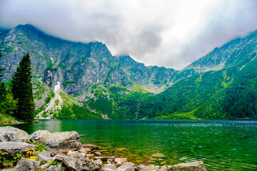 Tatra National Park in Poland. Mountains lake Morskie oko or Sea Eye lake In High Tatras. Five...