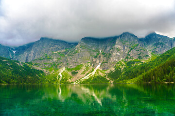 Fototapeta premium Tatra National Park in Poland. Mountains lake Morskie oko or Sea Eye lake In High Tatras. Five lakes valley
