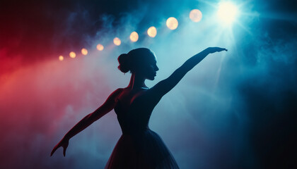 silhouette of a beautiful and talented ballerina woman in front of spotlights and smoke
