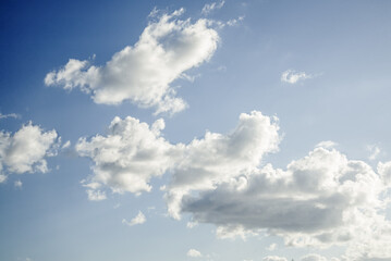 summer white clouds on the blue sky