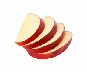Slices of ripe red apple isolated on white