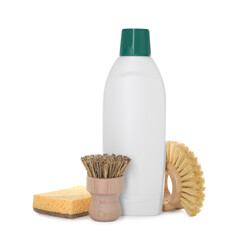 Bottle of cleaning product, brushes and sponge isolated on white