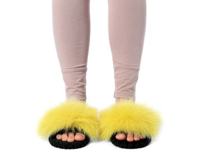 Woman in fluffy slippers on white background, closeup