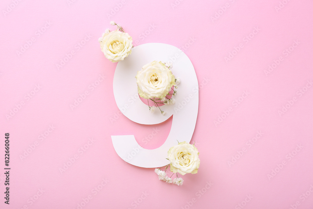Wall mural Paper number 9 and beautiful flowers on pink background, top view - Wall murals