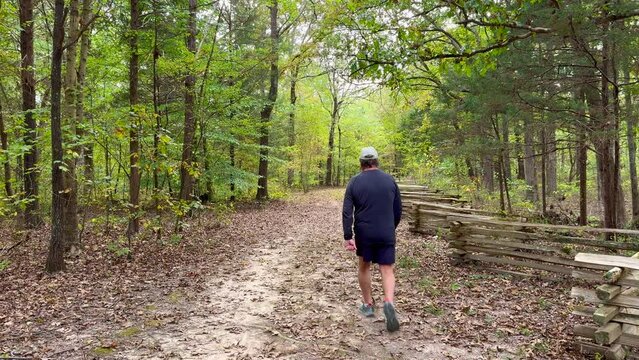 A man hiking along the Natchez Trace Parkway.