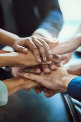 Business people, hands and stack together in office for collaboration on team project, problem solving and solidarity. Group, corporate and diversity for encouragement, synergy and support for work.