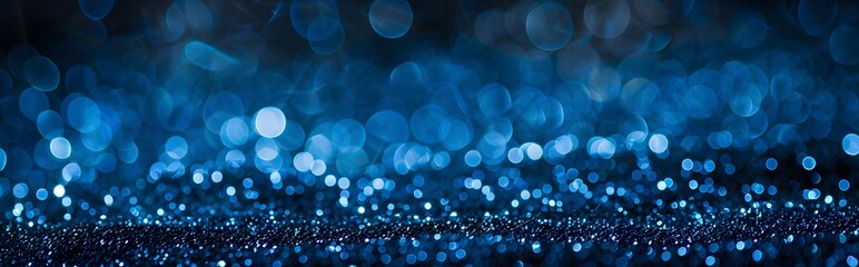 Abstract Background with Blue Glitter Lights and Bokeh