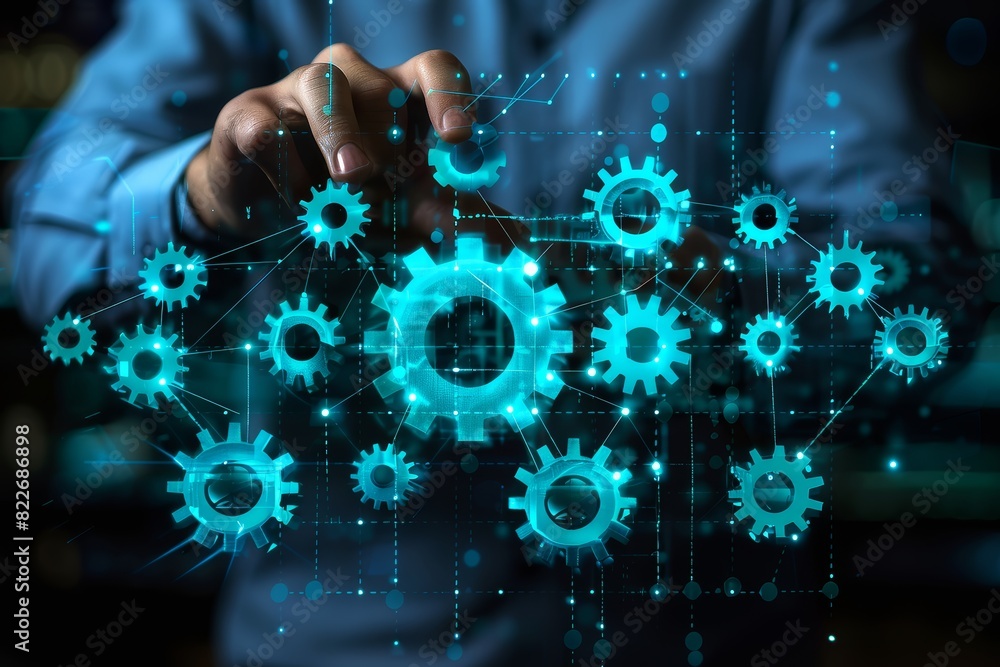 Poster Hand touching a digital interface with interconnected gears, symbolizing the intricate and innovative technology involved in modern digital systems and engineering mechanisms