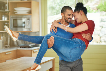 Happy, couple and carry woman in kitchen with love, care and together in apartment with pride....