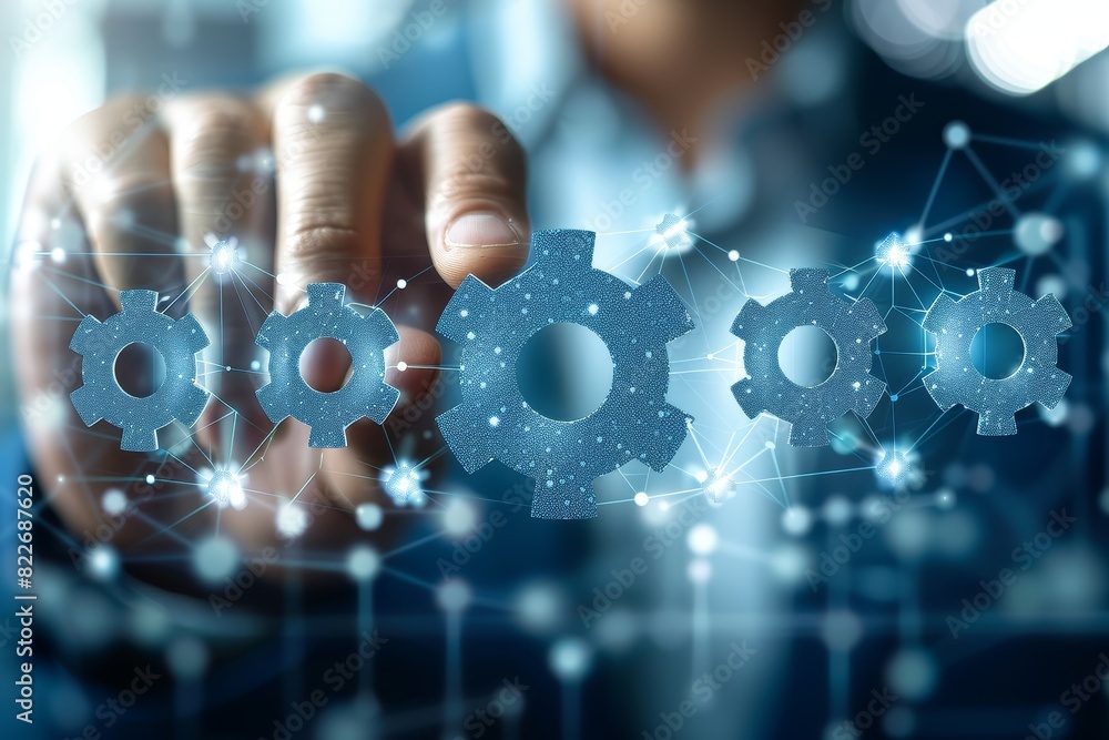 Poster Hand touching a digital interface with interconnected gears, symbolizing the intricate and innovative technology involved in modern digital systems and engineering mechanisms