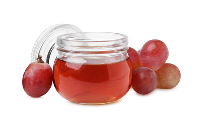 Wine vinegar in jar and grapes isolated on white