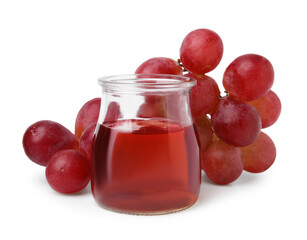 Wine vinegar in jar and grapes isolated on white