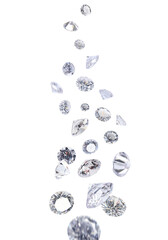 Beautiful shiny diamonds in air on white background