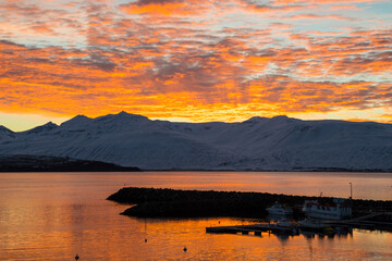 Sunset at the harbor of village of Hrisey in north Iceland