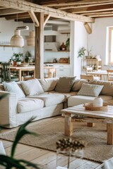 White couches and wooden beams in a cozy living room interior with a touch of rustic elegance