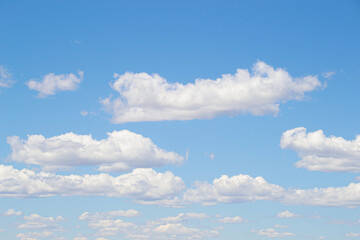 Blue sky with lots of clouds. Sky horizon with clouds and textures.
