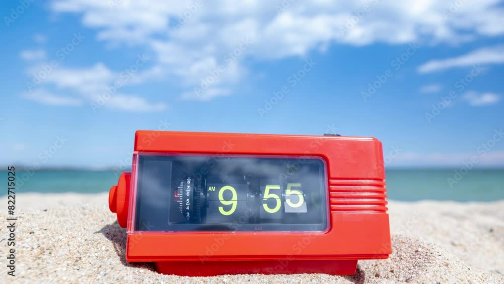 Poster flip clock with time passing on a beach with sky and sea in background