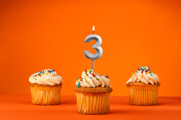Birthday celebration in orange color - Candle number 3