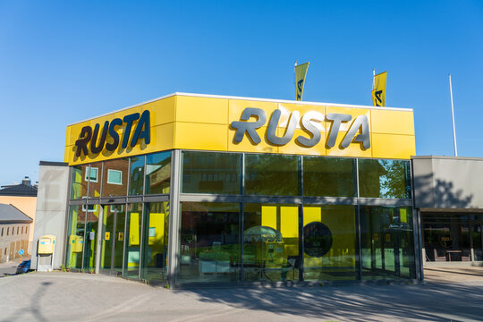 Rusta sign and entrance to the supermarket under clear blue sky. Rusta is a is a leading player in the Nordic hard discount market with more than 200 stores in Sweden