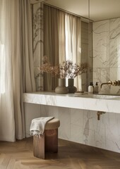 A simple modern bathroom with an oversized white marble vanity and wall mirrors featuring natural stone floors,