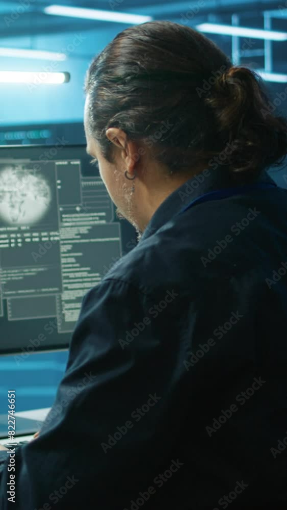 Poster vertical video system administrator in server room frightened by sensitive data threatened by hackin