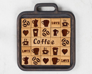 Little Coffee square cookies with a filling of coffee marmalade in the shape of a cup, heart,...