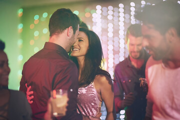Love, couple and dance in club at night on date with romance in marriage or relationship. People,...