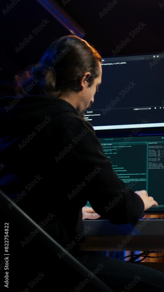 Poster vertical video hacker in hidden apartment trying to steal valuable data by targeting governmental we