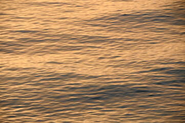 sunset reflection of the mediterranean sea in golden color at sunset 1