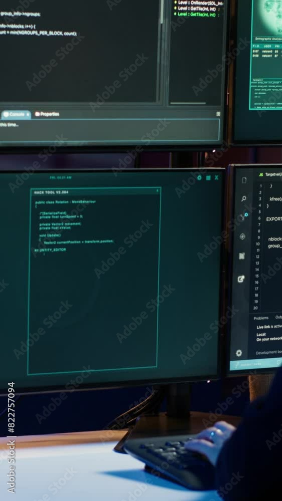 Poster vertical video lone wolf hacker in secret hideout trying to hide online activity after stealing data
