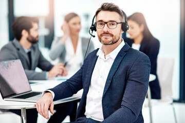 Man, portrait and headset at laptop or telemarketing at call centre or customer service, technical...