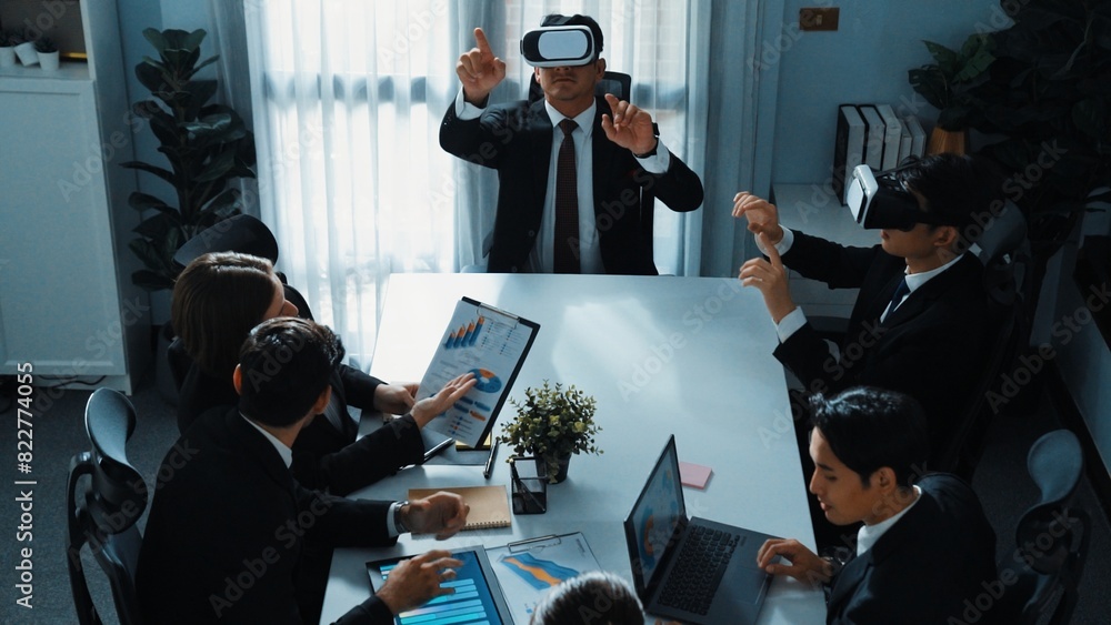 Poster top view of manager working on laptop and sending data analysis to business people by using vr glass