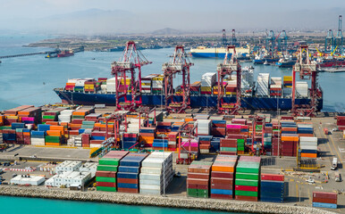Aerial view of the port of Callao in Lima, Peru, showing port activity with containers and cranes...