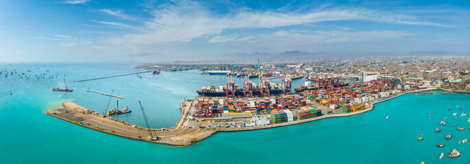 Aerial view of the port of Callao in Lima, Peru, showing port activity with containers and cranes...