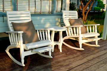 Wooden rocking chairs high back outdoor.
