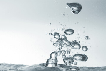 Macro shot of water bubbles form on oil surface